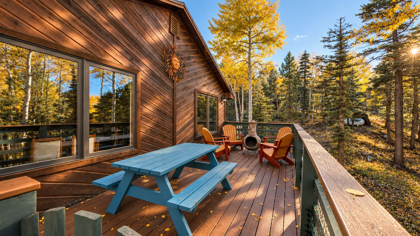 Deck with picnic table and fall aspens